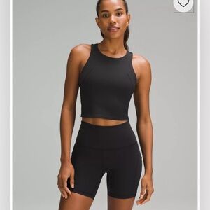 Wunder Train Racerback Tank Top
Medium Support. Color: black.